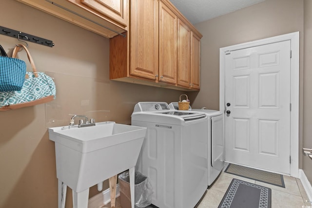 232 White Water Loop, Conway, SC 29526 - washroom featuring cabinet space, washer and dryer, and light tile patterned flooring