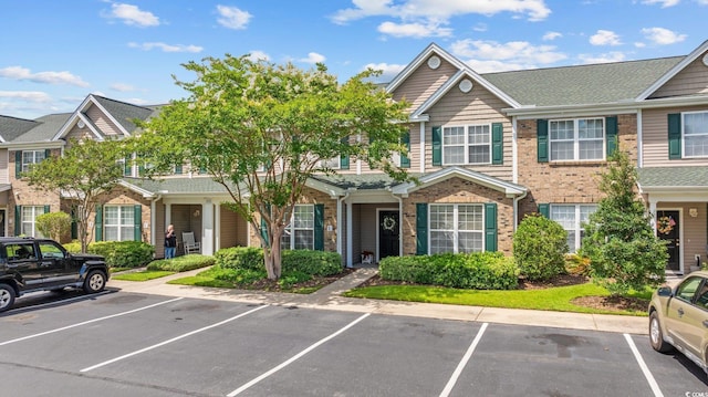 155 Chenoa Dr Unit E, Murrells Inlet, SC 29576 - view of property with uncovered parking and brick siding