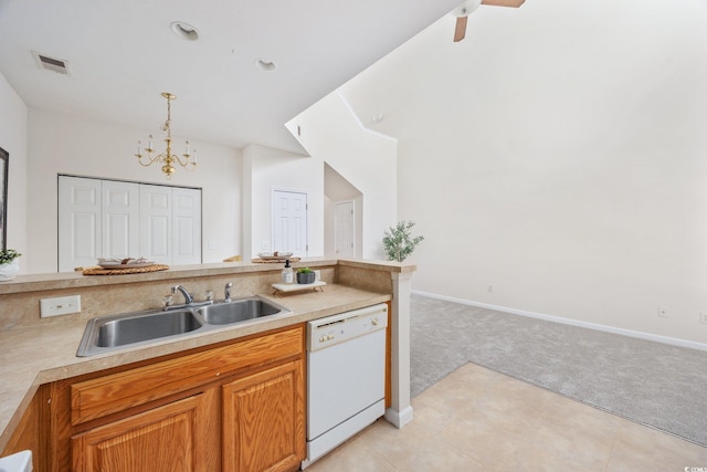 155 Chenoa Dr Unit E, Murrells Inlet, SC 29576 - kitchen featuring dishwasher, light colored carpet, a chandelier, light countertops, and hanging light fixtures
