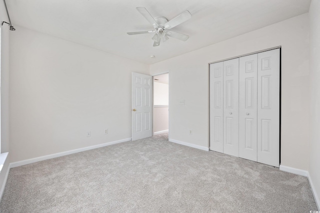 155 Chenoa Dr Unit E, Murrells Inlet, SC 29576 - unfurnished bedroom featuring carpet, a closet, and ceiling fan