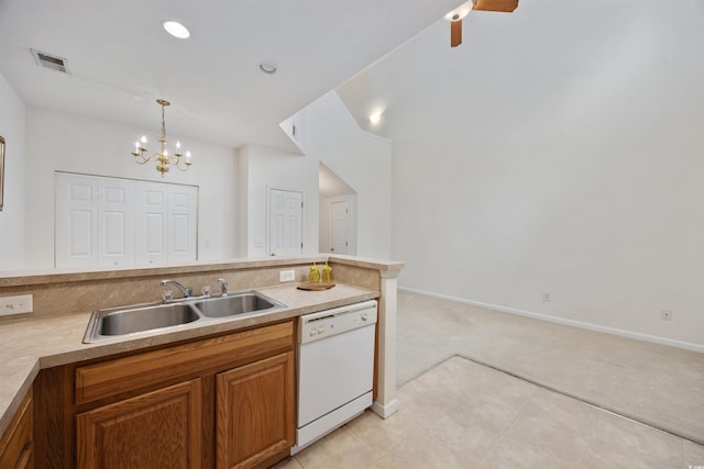 155 Chenoa Dr Unit D, Murrells Inlet, SC 29576 - kitchen featuring white dishwasher, light colored carpet, a chandelier, brown cabinets, and decorative light fixtures