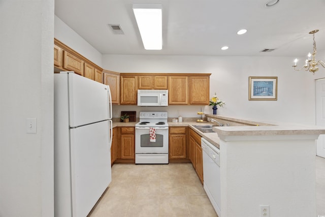 155 Chenoa Dr Unit D, Murrells Inlet, SC 29576 - kitchen featuring white appliances, a peninsula, light countertops, light tile patterned floors, and recessed lighting