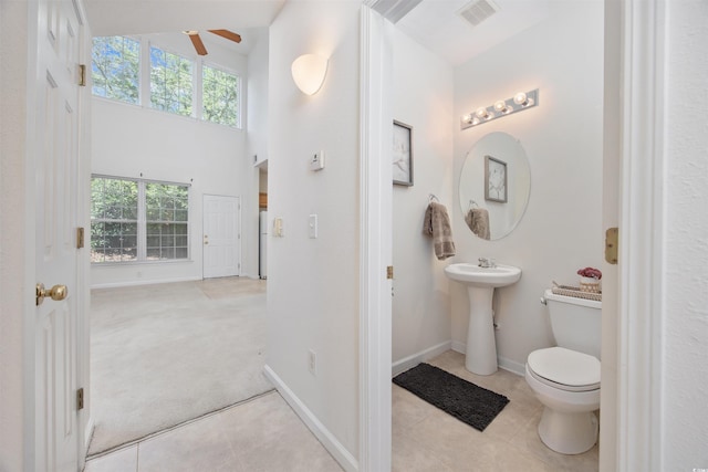 155 Chenoa Dr Unit D, Murrells Inlet, SC 29576 - bathroom with ceiling fan, tile patterned floors, and a high ceiling