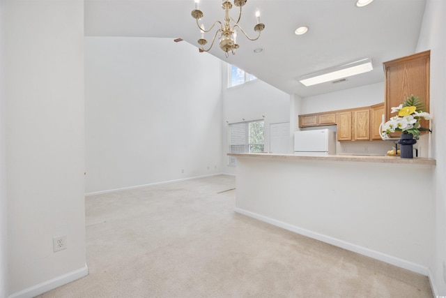 155 Chenoa Dr Unit D, Murrells Inlet, SC 29576 - unfurnished living room featuring light colored carpet, a chandelier, high vaulted ceiling, and recessed lighting