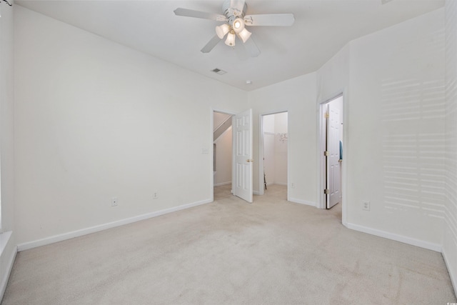 155 Chenoa Dr Unit D, Murrells Inlet, SC 29576 - unfurnished bedroom with carpet flooring, a ceiling fan, a walk in closet, and a closet