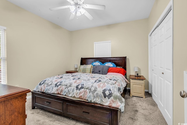 3969 Murrells Inlet Rd, Murrells Inlet, SC 29576 - bedroom featuring light colored carpet, a closet, and a ceiling fan