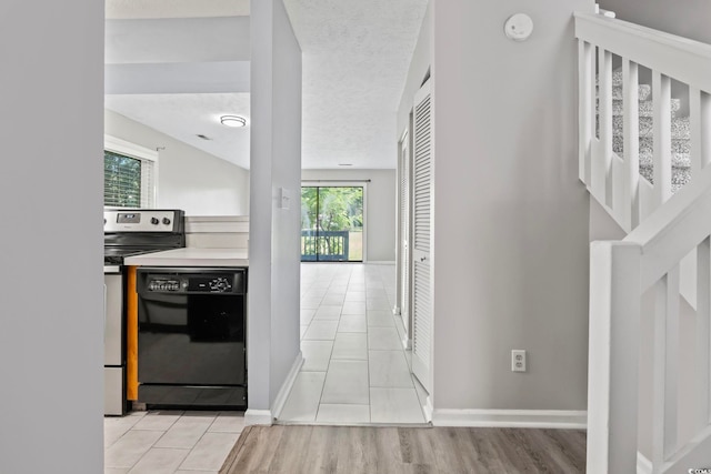 4049 Fairway Lakes Dr Unit 4049, Myrtle Beach, SC 29577 - hall with light tile patterned floors and a textured ceiling
