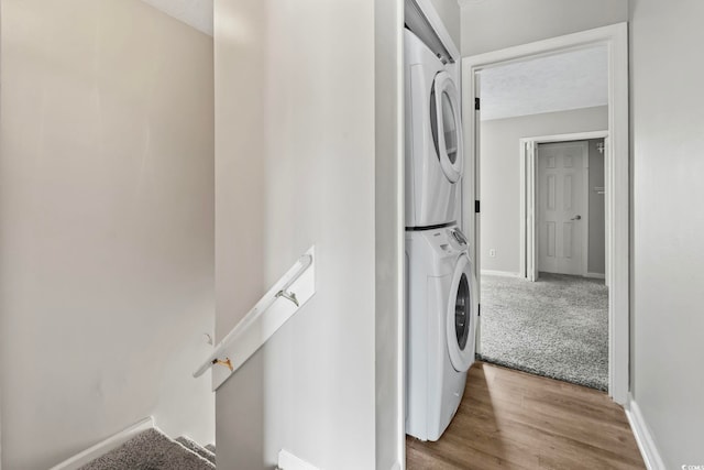 4049 Fairway Lakes Dr Unit 4049, Myrtle Beach, SC 29577 - laundry area with stacked washing machine and dryer and wood finished floors