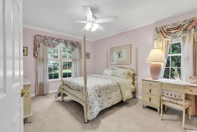 241 Black Duck Rd, Pawleys Island, SC 29585 - bedroom featuring light carpet, ornamental molding, multiple windows, and a ceiling fan