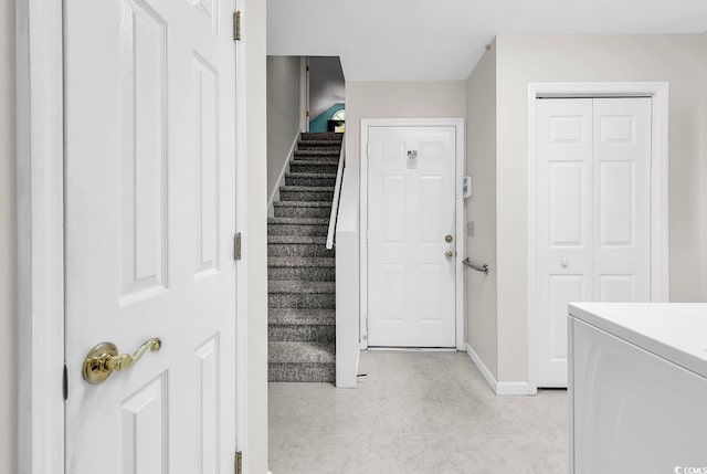 241 Black Duck Rd, Pawleys Island, SC 29585 - entryway with baseboards and stairway