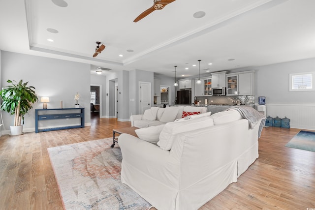 277 Splendor Cir, Murrells Inlet, SC 29576 - living area with ceiling fan, light wood finished floors, a tray ceiling, and recessed lighting