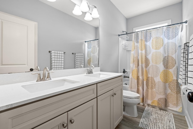 277 Splendor Cir, Murrells Inlet, SC 29576 - bathroom featuring shower / bath combo with shower curtain, double vanity, and wood finished floors