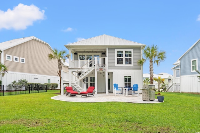 277 Splendor Cir, Murrells Inlet, SC 29576 - rear view of house featuring stairs, a patio, and board and batten siding