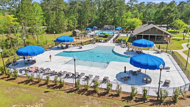 277 Splendor Cir, Murrells Inlet, SC 29576 - community pool featuring view of wooded area and a patio area