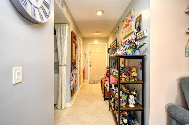 1025 Plantation Dr Unit 2413/2414, Little River, SC 29566 - hall featuring light tile patterned flooring and baseboards