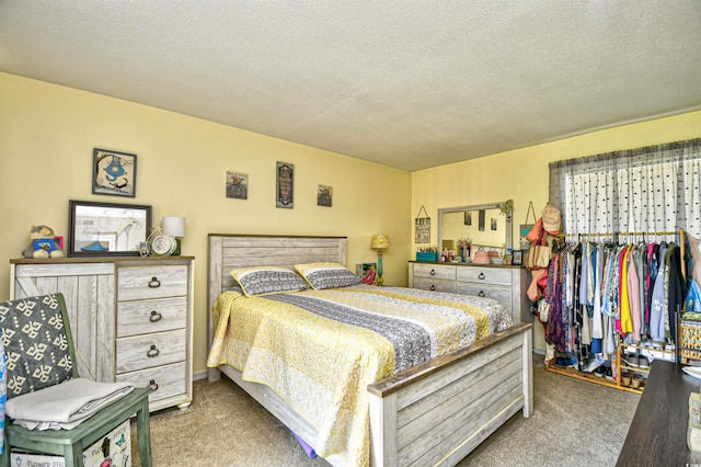 1025 Plantation Dr Unit 2413/2414, Little River, SC 29566 - bedroom with carpet floors and a textured ceiling