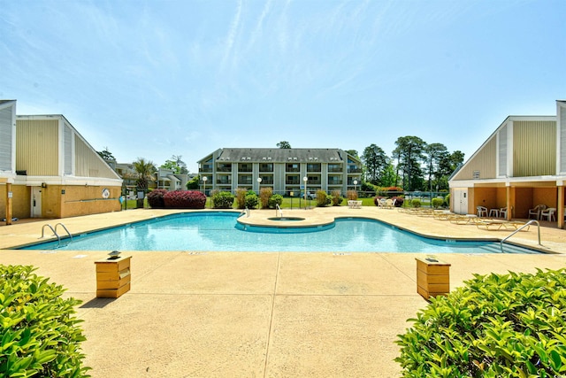 1025 Plantation Dr Unit 2413/2414, Little River, SC 29566 - community pool with a patio area