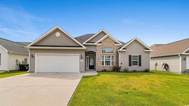 347 Leste Rd, Myrtle Beach, SC 29588 - traditional home featuring a front lawn, concrete driveway, an attached garage, and brick siding