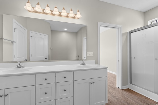 347 Leste Rd, Myrtle Beach, SC 29588 - full bath featuring a shower stall, wood finished floors, and double vanity