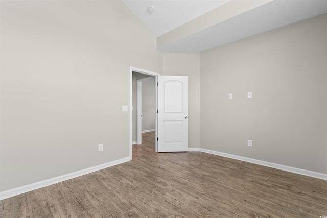 347 Leste Rd, Myrtle Beach, SC 29588 - empty room with wood finished floors, high vaulted ceiling, and a smoke detector
