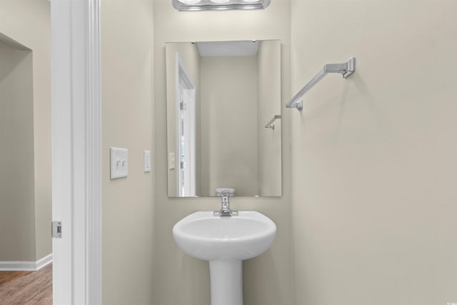 347 Leste Rd, Myrtle Beach, SC 29588 - bathroom featuring wood finished floors and baseboards