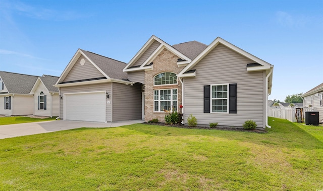 347 Leste Rd, Myrtle Beach, SC 29588 - traditional-style house with concrete driveway, an attached garage, brick siding, and a shingled roof