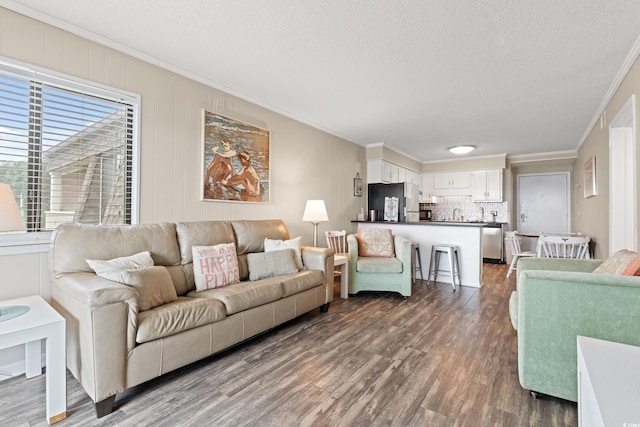 5601 N Ocean Blvd Unit B-314, Myrtle Beach, SC 29577 - living area with crown molding, dark wood-style floors, and a textured ceiling