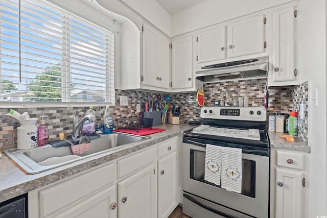 1311 Turkey Ridge Rd Unit A, Surfside Beach, SC 29575 - kitchen featuring electric range, under cabinet range hood, tasteful backsplash, and white cabinets