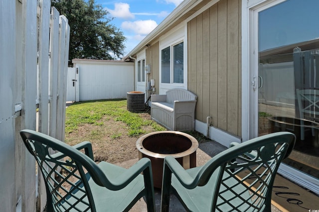 1311 Turkey Ridge Rd Unit A, Surfside Beach, SC 29575 - view of patio featuring an outdoor fire pit