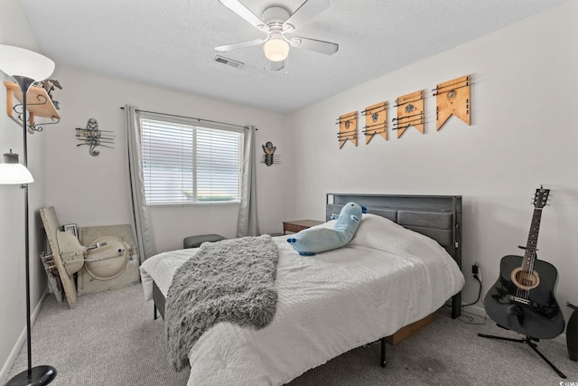 1311 Turkey Ridge Rd Unit A, Surfside Beach, SC 29575 - bedroom featuring carpet floors, a textured ceiling, and a ceiling fan