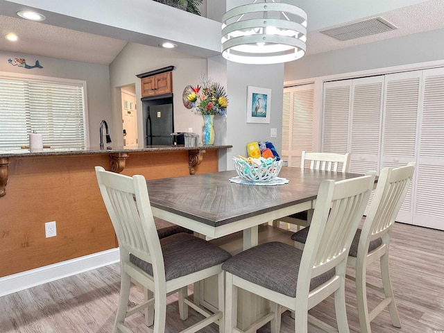 145 Hartland Dr Unit 4-E, Myrtle Beach, SC 29572 - dining area with light wood-style flooring and recessed lighting