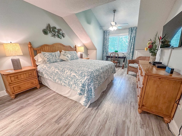 145 Hartland Dr Unit 4-E, Myrtle Beach, SC 29572 - bedroom featuring light wood finished floors, lofted ceiling, and ceiling fan