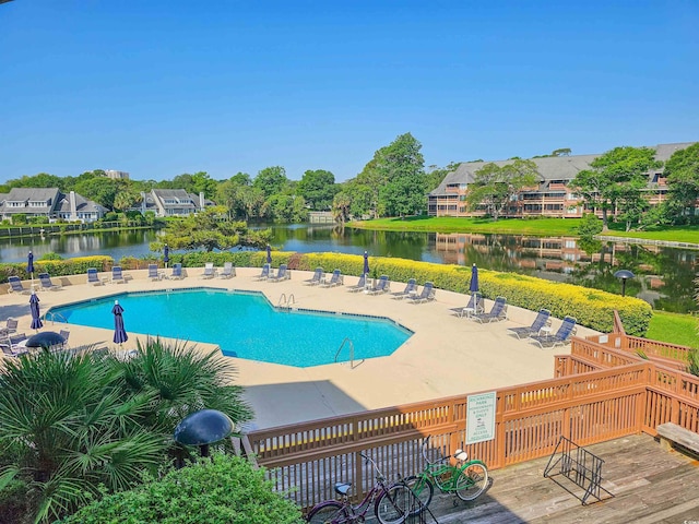 145 Hartland Dr Unit 4-E, Myrtle Beach, SC 29572 - community pool with a deck with water view and a patio area