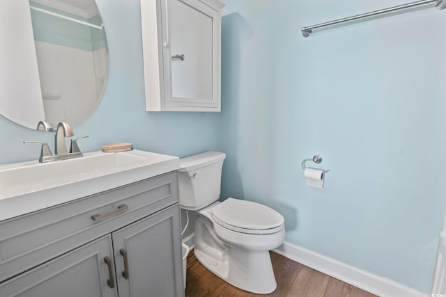 4105 S Ocean Blvd Unit 102, North Myrtle Beach, SC 29582 - bathroom featuring vanity, wood finished floors, and ornamental molding