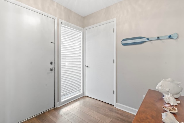 4105 S Ocean Blvd Unit 102, North Myrtle Beach, SC 29582 - foyer entrance featuring hardwood / wood-style flooring and baseboards
