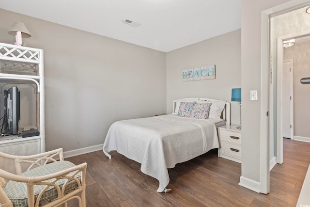 4105 S Ocean Blvd Unit 102, North Myrtle Beach, SC 29582 - bedroom with wood finished floors