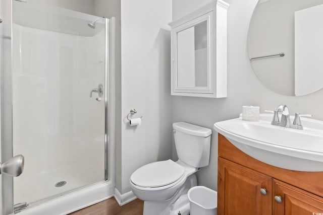 4105 S Ocean Blvd Unit 102, North Myrtle Beach, SC 29582 - full bath with a stall shower, vanity, and wood finished floors