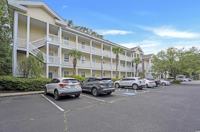 4221 Hibiscus Dr Unit 8-203, Little River, SC 29566 - view of apartment building / complex with uncovered parking