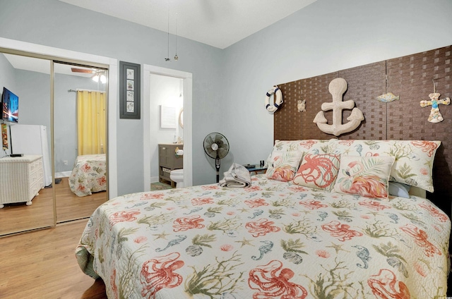 4221 Hibiscus Dr Unit 8-203, Little River, SC 29566 - bedroom with wood finished floors, a closet, and ensuite bath