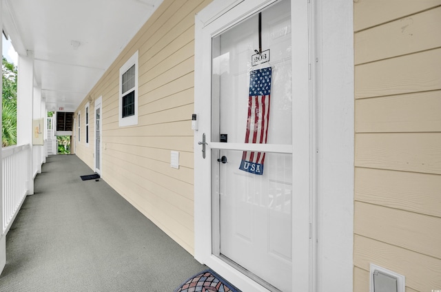 4221 Hibiscus Dr Unit 8-203, Little River, SC 29566 - view of exterior entry with covered porch