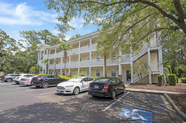 4221 Hibiscus Dr Unit 8-203, Little River, SC 29566 - view of property featuring uncovered parking