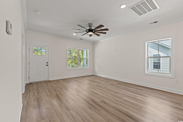 1718 26th Ave N, North Myrtle Beach, SC 29582 - spare room featuring crown molding, a ceiling fan, light wood finished floors, and recessed lighting