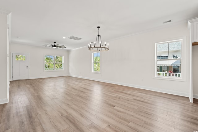 1718 26th Ave N, North Myrtle Beach, SC 29582 - empty room featuring a chandelier, light wood finished floors, crown molding, and a ceiling fan