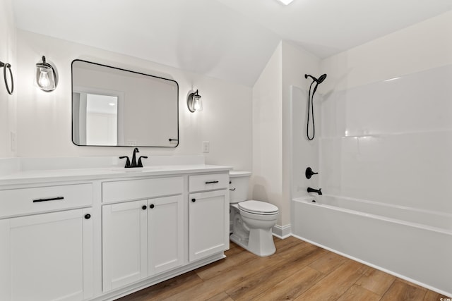 1718 26th Ave N, North Myrtle Beach, SC 29582 - bathroom featuring vanity, wood finished floors, bathtub / shower combination, and lofted ceiling