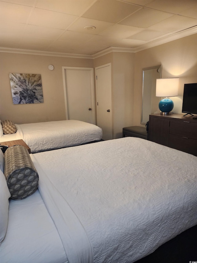 1105 S Ocean Blvd Unit 218, Myrtle Beach, SC 29577 - bedroom featuring ornamental molding