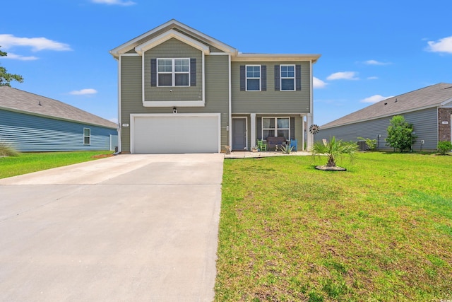 190 Belmonte Dr, Myrtle Beach, SC 29588 - view of front facade featuring a garage, concrete driveway, and a front lawn