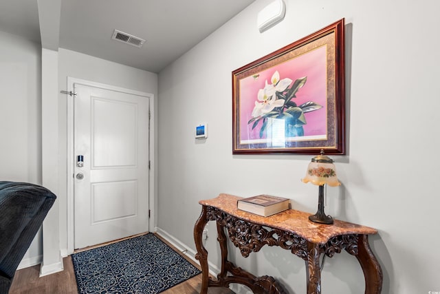 190 Belmonte Dr, Myrtle Beach, SC 29588 - foyer with baseboards and wood finished floors