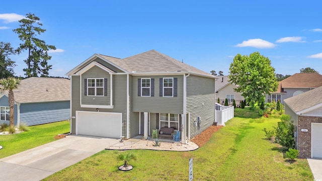 190 Belmonte Dr, Myrtle Beach, SC 29588 - view of front of house with a garage, concrete driveway, and a front yard
