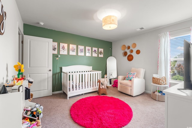 190 Belmonte Dr, Myrtle Beach, SC 29588 - bedroom with carpet flooring and a crib