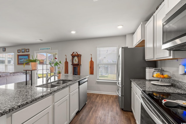 190 Belmonte Dr, Myrtle Beach, SC 29588 - kitchen with appliances with stainless steel finishes, healthy amount of natural light, white cabinetry, and recessed lighting